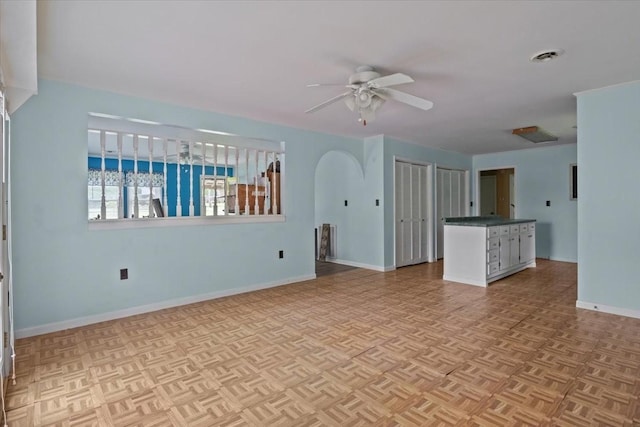 7158 Bahne Rd, Fairview, TN 37062 - unfurnished living room featuring ceiling fan and baseboards
