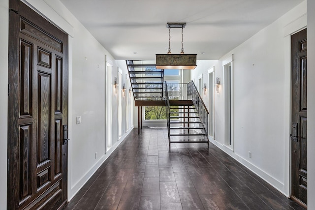 3910 Brick Church Pike, Nashville, TN 37207 - entrance foyer featuring stairway, baseboards, and dark wood finished floors