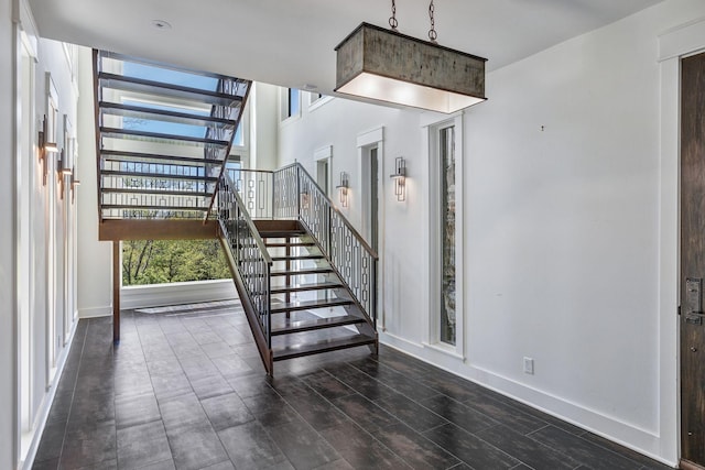3910 Brick Church Pike, Nashville, TN 37207 - stairway with baseboards and wood finished floors