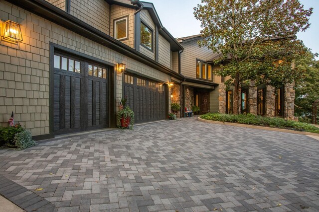 3910 Brick Church Pike, Nashville, TN 37207 - view of side of home with decorative driveway and stone siding