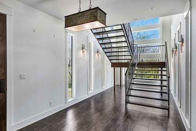 3910 Brick Church Pike, Nashville, TN 37207 - staircase featuring baseboards and wood finished floors