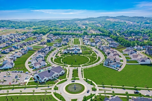 aerial view of residential area featuring a mountainous background