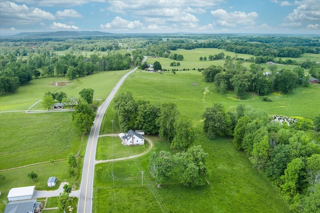 aerial view of sparsely populated area featuring a pastoral area
