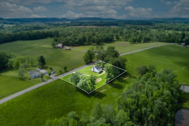 aerial view of sparsely populated area with property parcel outlined