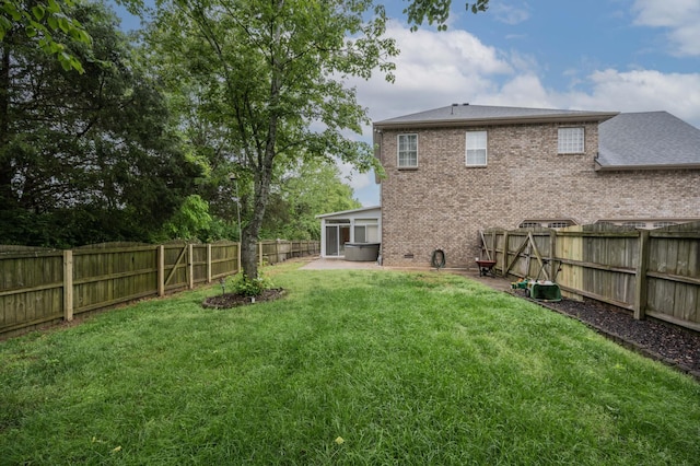 view of yard featuring a sunroom
