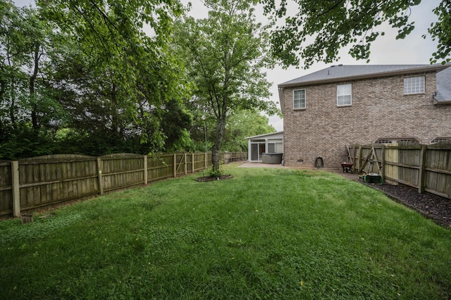 view of yard with a sunroom