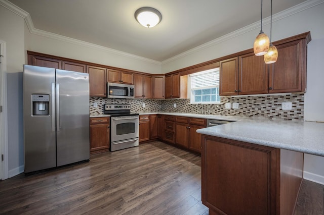 kitchen with stainless steel appliances, a peninsula, dark wood-style flooring, crown molding, and pendant lighting