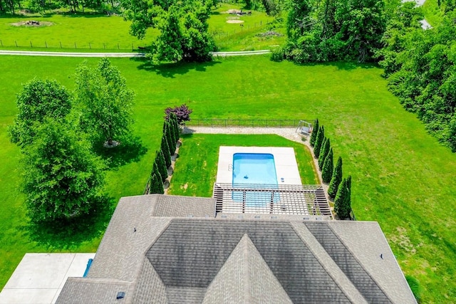 view from above of property featuring a pool