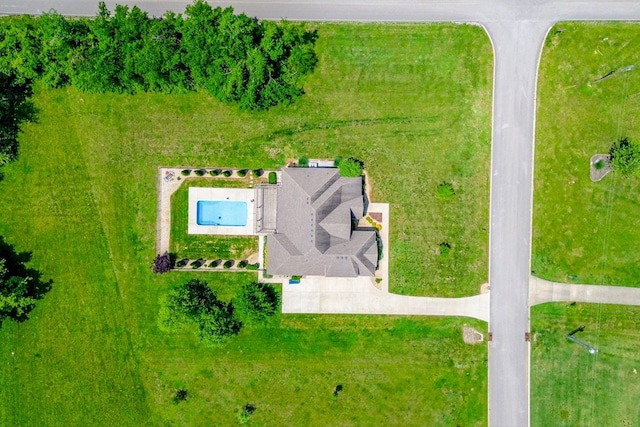 view from above of property with a pool area