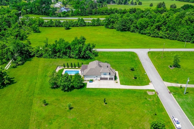 view from above of property featuring a pool