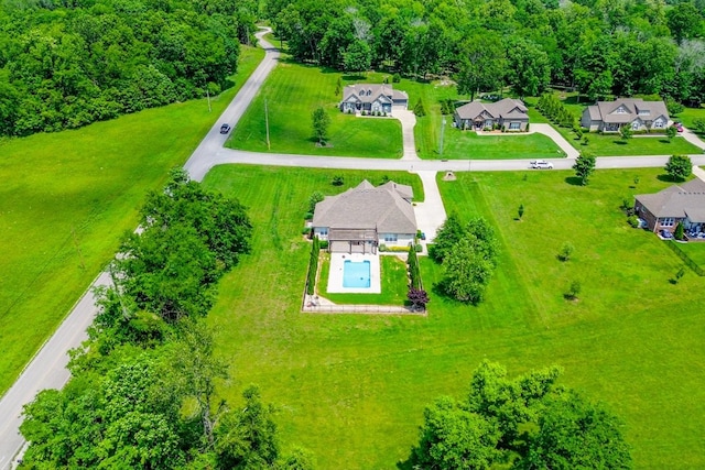 aerial view of residential area with a pool area