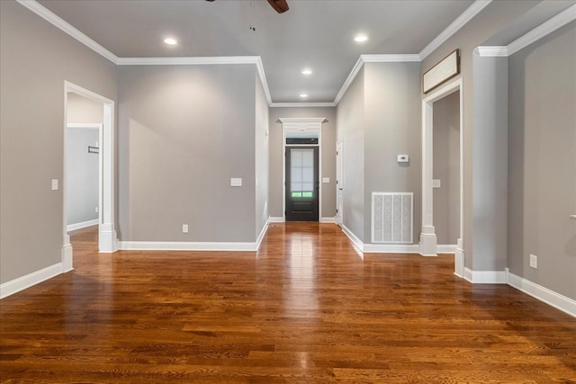 entrance foyer with dark wood-type flooring, a ceiling fan, recessed lighting, ornamental molding, and baseboards