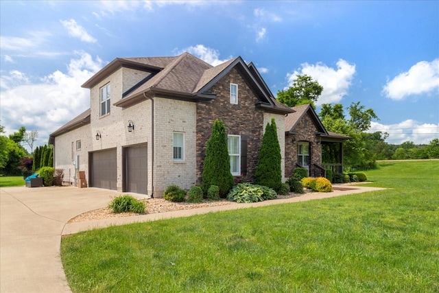 view of property exterior featuring a garage, a lawn, driveway, roof with shingles, and brick siding