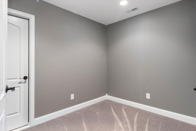 unfurnished room featuring carpet floors, baseboards, and recessed lighting