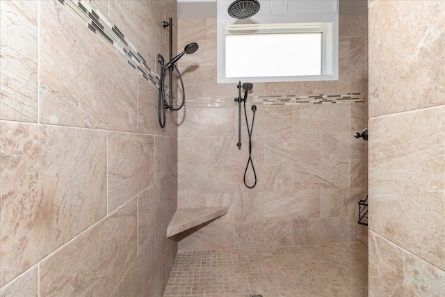 bathroom featuring tiled shower