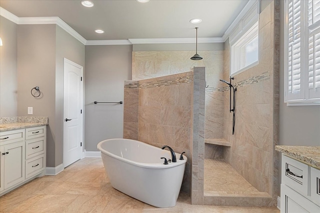 bathroom featuring crown molding, vanity, a walk in shower, a freestanding tub, and recessed lighting