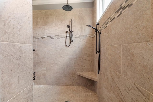 bathroom featuring a tile shower