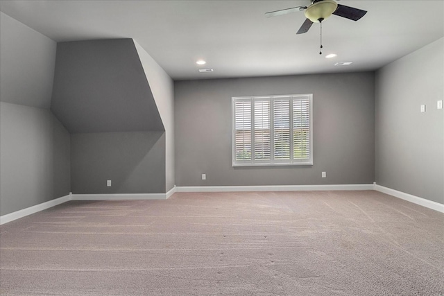 additional living space featuring carpet flooring, baseboards, ceiling fan, and recessed lighting