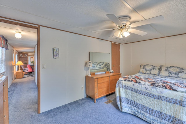 1687 Columbia Rock Rd, Columbia, TN 38401 - carpeted bedroom featuring a textured ceiling and a ceiling fan