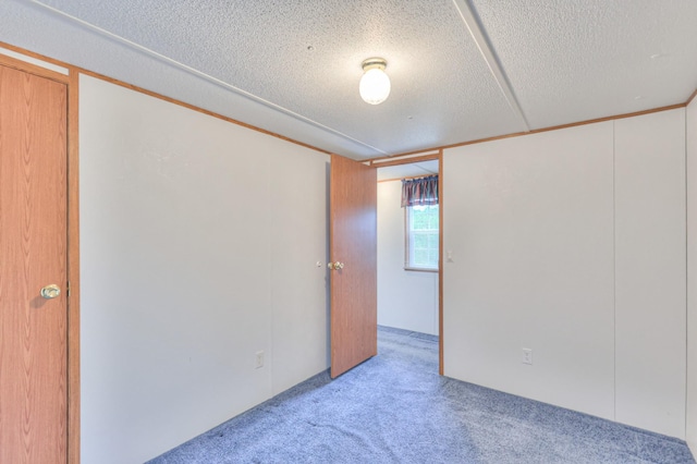 1687 Columbia Rock Rd, Columbia, TN 38401 - empty room with carpet flooring and a textured ceiling