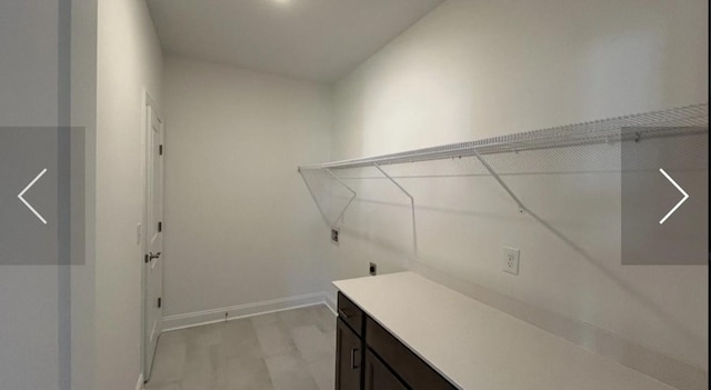 6158 Worthingtion Rd, Columbia, TN 38401 - washroom featuring electric dryer hookup and cabinet space