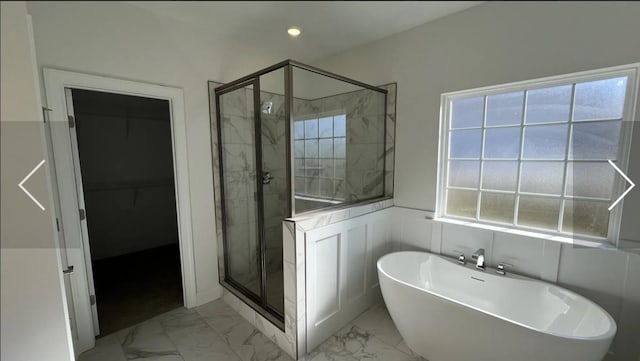 6158 Worthingtion Rd, Columbia, TN 38401 - full bath with a freestanding tub, a shower stall, marble finish floors, a walk in closet, and recessed lighting