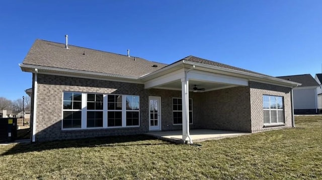 6158 Worthingtion Rd, Columbia, TN 38401 - rear view of house with a ceiling fan, a patio, a lawn, and brick siding