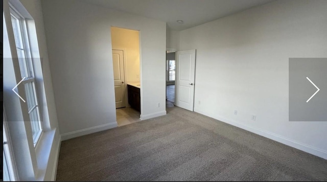 6158 Worthingtion Rd, Columbia, TN 38401 - unfurnished bedroom with light colored carpet and ensuite bathroom
