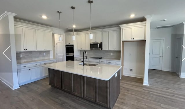 6158 Worthingtion Rd, Columbia, TN 38401 - kitchen featuring appliances with stainless steel finishes, decorative backsplash, dark wood-style floors, white cabinets, and recessed lighting