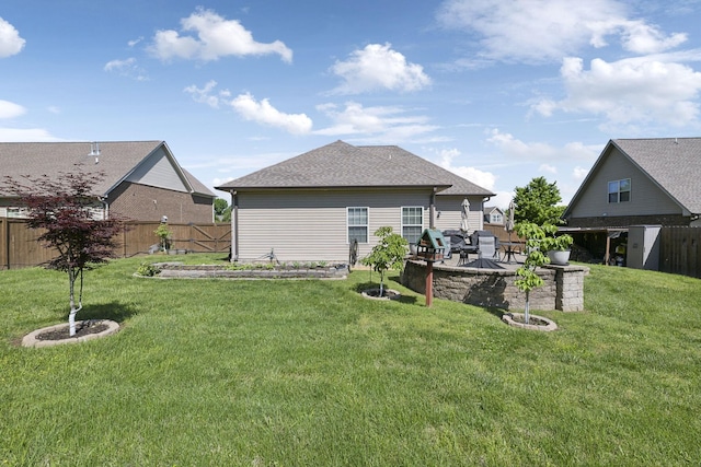 589 Smoky Mountains Dr, Gallatin, TN 37066 - back of property with a patio area and roof with shingles
