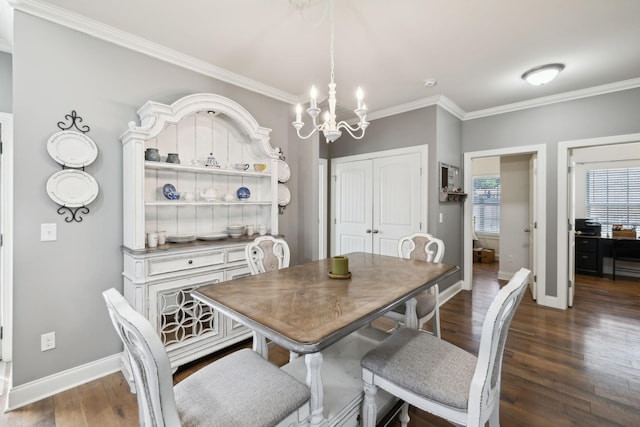 589 Smoky Mountains Dr, Gallatin, TN 37066 - dining room with a chandelier, crown molding, wood finished floors, and baseboards