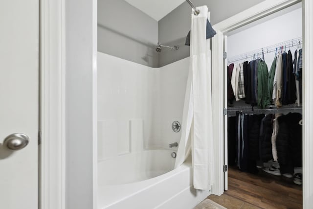 589 Smoky Mountains Dr, Gallatin, TN 37066 - full bathroom featuring wood finished floors, shower / bath combination with curtain, and a walk in closet