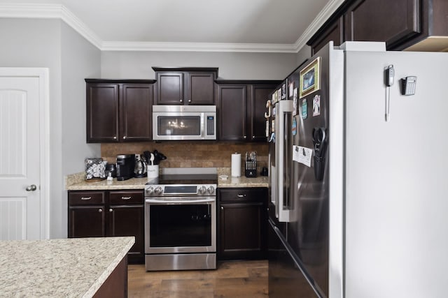 589 Smoky Mountains Dr, Gallatin, TN 37066 - kitchen featuring stainless steel appliances, dark wood-style floors, tasteful backsplash, ornamental molding, and dark brown cabinets