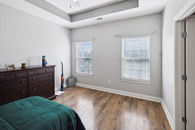 589 Smoky Mountains Dr, Gallatin, TN 37066 - bedroom with baseboards, hardwood / wood-style flooring, and a raised ceiling