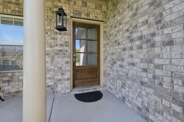 589 Smoky Mountains Dr, Gallatin, TN 37066 - property entrance featuring brick siding and covered porch
