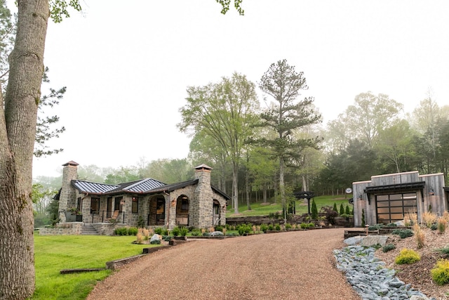 5564 Wilkins Branch Rd, Franklin, TN 37064 - view of green lawn featuring driveway, covered porch, and an attached garage