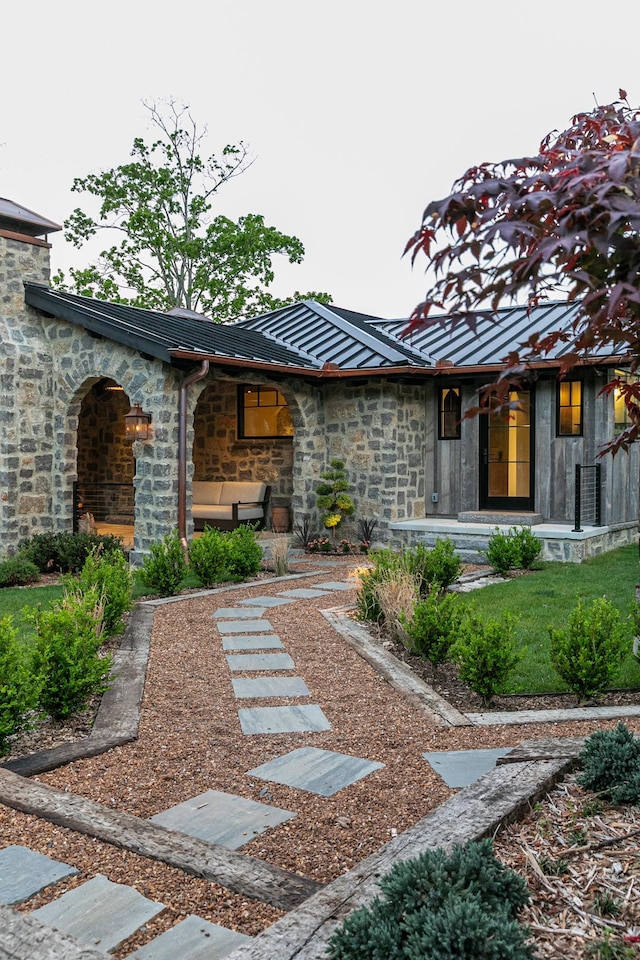 5564 Wilkins Branch Rd, Franklin, TN 37064 - view of front of home featuring stone siding and a standing seam roof