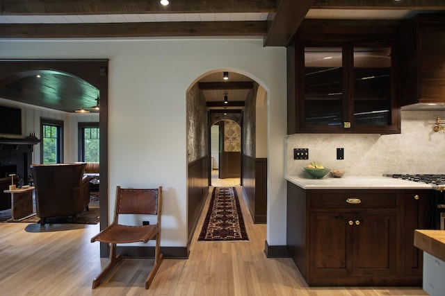 5564 Wilkins Branch Rd, Franklin, TN 37064 - hall featuring arched walkways, beamed ceiling, light wood-style flooring, baseboards, and wood ceiling