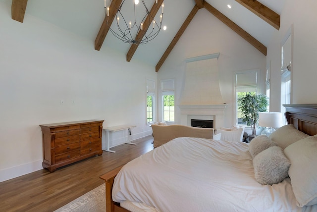 1461 Witherspoon Dr, Brentwood, TN 37027 - bedroom with a fireplace, high vaulted ceiling, beamed ceiling, wood finished floors, and multiple windows