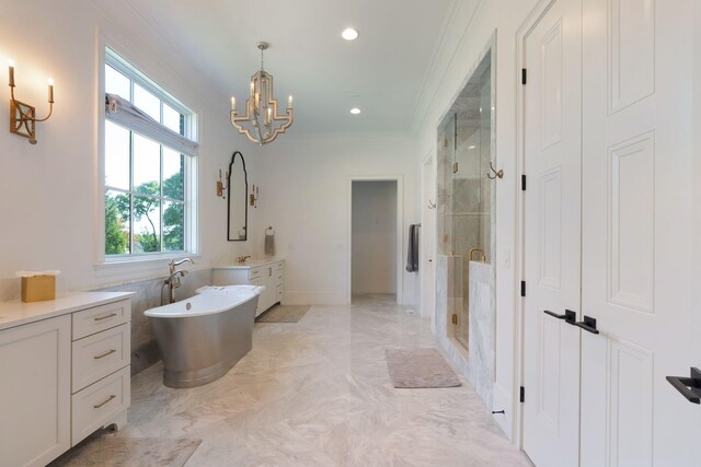 1461 Witherspoon Dr, Brentwood, TN 37027 - bathroom with a chandelier, a shower stall, crown molding, a freestanding tub, and vanity