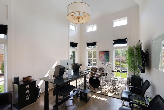 1461 Witherspoon Dr, Brentwood, TN 37027 - home office featuring a high ceiling, wood finished floors, and a chandelier