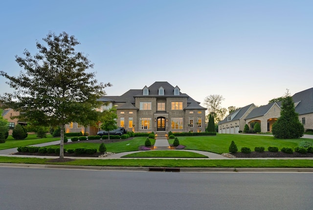 1461 Witherspoon Dr, Brentwood, TN 37027 - french country style house with a front lawn and stone siding