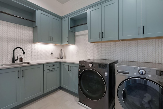 1461 Witherspoon Dr, Brentwood, TN 37027 - washroom featuring washer and clothes dryer, cabinet space, and light floors