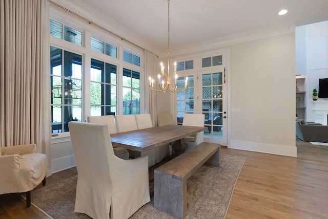 1461 Witherspoon Dr, Brentwood, TN 37027 - dining room with a chandelier, crown molding, light wood-style floors, baseboards, and recessed lighting