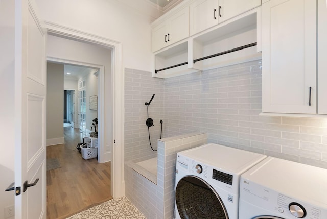 1461 Witherspoon Dr, Brentwood, TN 37027 - laundry area featuring separate washer and dryer and wood finished floors
