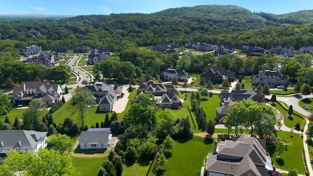 1461 Witherspoon Dr, Brentwood, TN 37027 - aerial perspective of suburban area with a heavily wooded area and a mountainous background