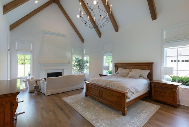 1461 Witherspoon Dr, Brentwood, TN 37027 - bedroom featuring beam ceiling, high vaulted ceiling, wood finished floors, a fireplace, and multiple windows