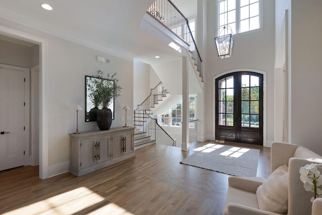 1461 Witherspoon Dr, Brentwood, TN 37027 - foyer featuring stairway, baseboards, a high ceiling, light wood-style flooring, and recessed lighting