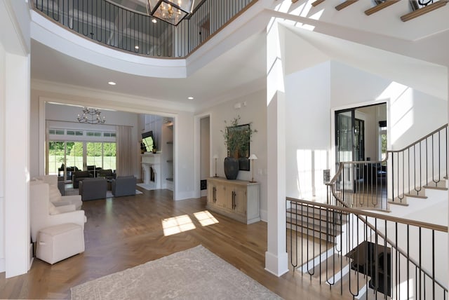 1461 Witherspoon Dr, Brentwood, TN 37027 - entryway featuring a chandelier, a towering ceiling, ornamental molding, baseboards, and stairway