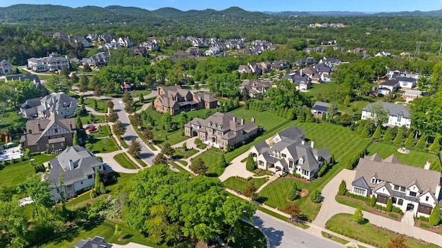 1461 Witherspoon Dr, Brentwood, TN 37027 - aerial view of property and surrounding area with nearby suburban area and a mountainous background
